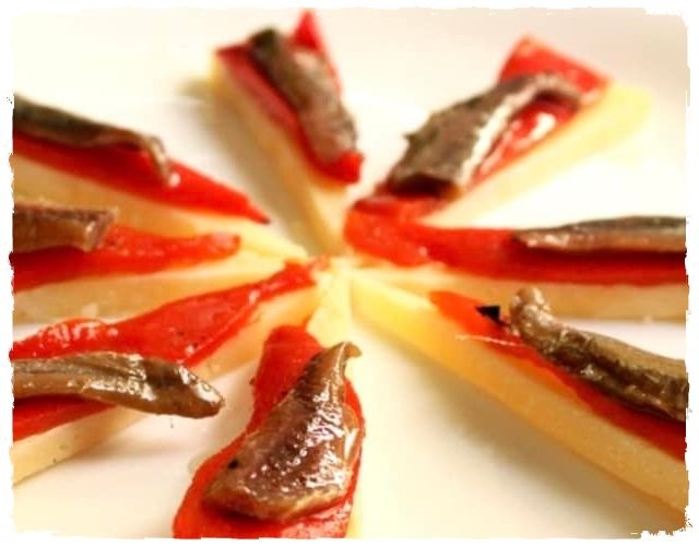 https://www.nooddle.es/receta/queso-con-anchoas-y-pimientos